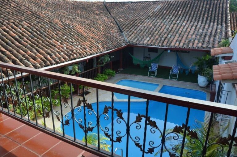 Beat the heat, relax with a drink in our swimming pool
